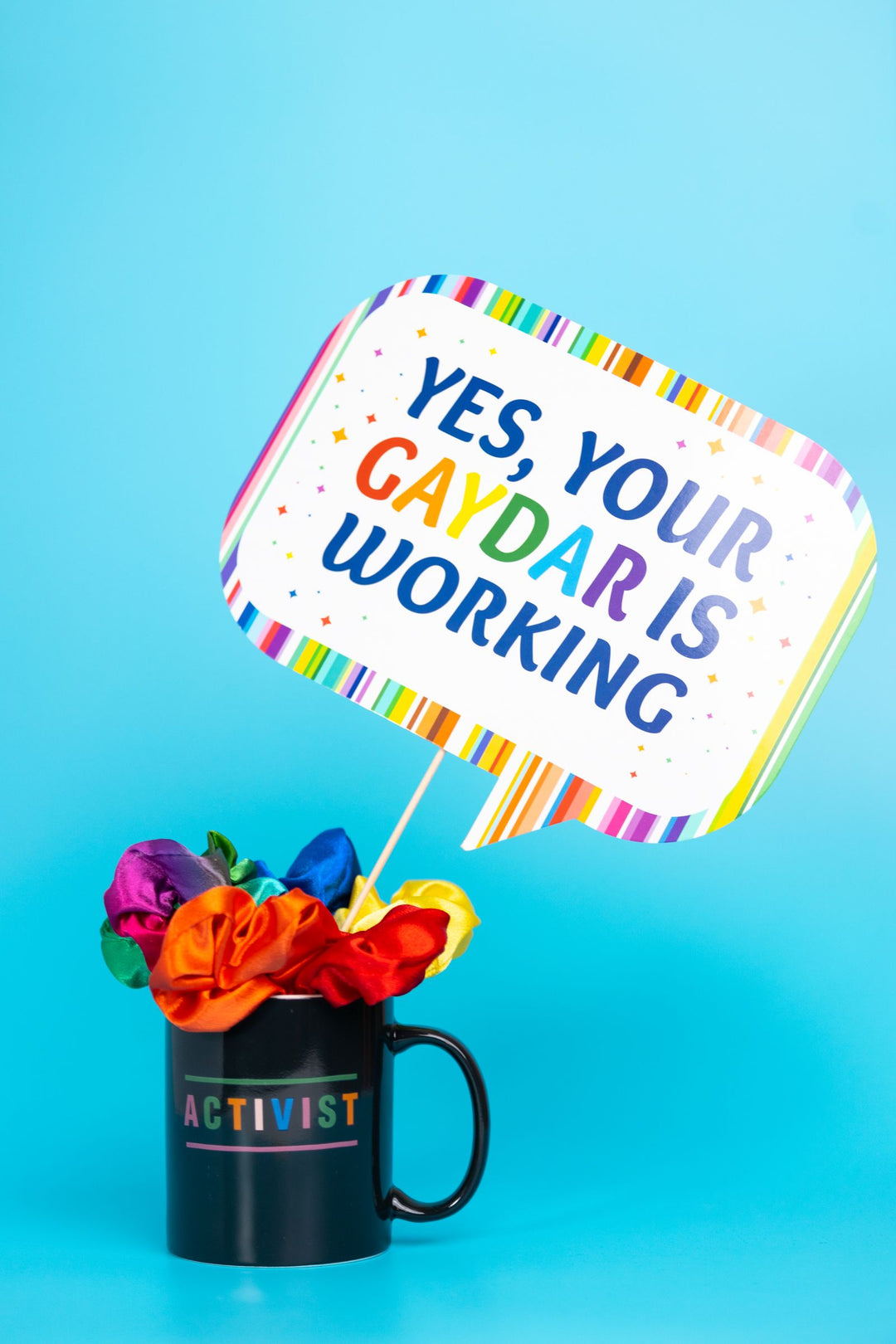 Pride mug gift idea — a colorful rainbow LGBTQ+ pride coffee mug with pride decor